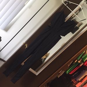 Tight, black jumpsuit. (SMALL)